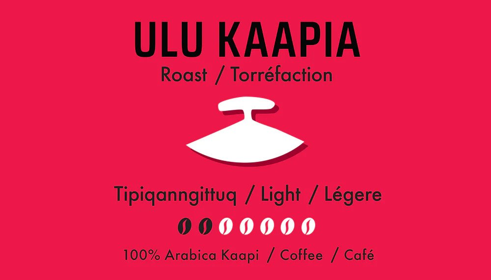 Coffee label for Ulu Kaapia Coffee. It has a red background with a white silhouette of an ulu in the centre. Bold, black text reads: ULU KAAPIA | Roast / Torrefaction | Tipiqanngittuq / Light / Legere | 100% Arabica Kaapi / Coffee / Cafe